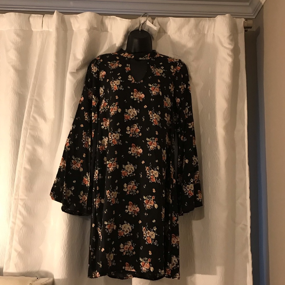 Swing dress with flute sleeves
